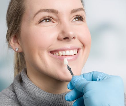 Woman smiling with implant