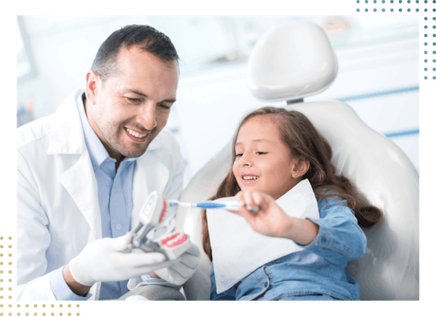 Dentist and Child Smiling